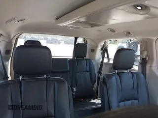 2014 Chrysler Town & Country Touring with VIN 2C4RC1BG1ER453328, listed as a IAAI auction lot 42135021 with 138,443 mi miles. Bid and sale history available at carsss.com. Image 8.