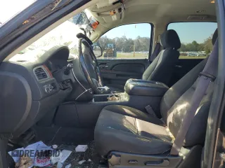 2011 Chevrolet Suburban LS with VIN 1GNSCHE0XBR294973, listed as a Copart auction lot 77258024 with 193,139 mi miles and Salvage Title. Bid and sale history available at carsss.com. Image 7.