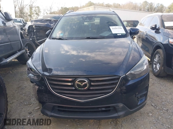 2016 Mazda CX-5 Grand Touring with VIN JM3KE2DY1G0708572, listed as a IAAI auction lot 41685298 with 109,427 mi miles. Bid and sale history available at carsss.com. Image 12.