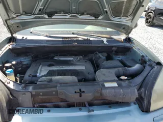 2005 Hyundai Tucson GL with VIN KM8JM12B05U151056, listed as a Copart auction lot 49132425 with 95,450 mi miles and Salvage Title. Bid and sale history available at carsss.com. Image 12.