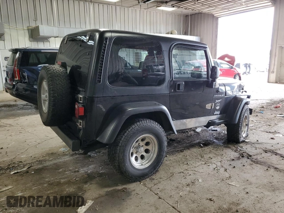 2002 Jeep Wrangler Sport with VIN 1J4FA49S62P713475, listed as a Copart auction lot 59299965 with 114,654 mi miles and Non repairable. Bid and sale history available at DreamBid. Image 3.