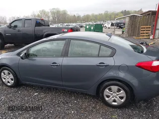 2016 Kia Forte LX with VIN KNAFK4A69G5560835, listed as a IAAI auction lot 42003212 with 100,873 mi miles. Bid and sale history available at carsss.com. Image 14.