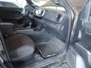 2017 Toyota Tacoma SR5 with VIN 3TMCZ5AN6HM045057, listed as a IAAI auction lot 41883533 with 213,760 mi miles and . Bid and sale history available at carsss.com. Image 5.