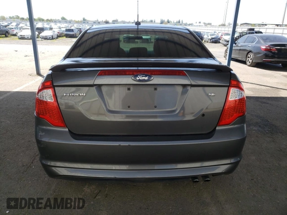 2012 Ford Fusion SE z VIN 3FAHP0HAXCR231865, wystawiony jako Copart lot #52644815 z przebiegiem 153 058 mil mil oraz Szkoda całkowita • Salvage title. Historia ofert i sprzedaży dostępna na DreamBid. Obrazek 6.