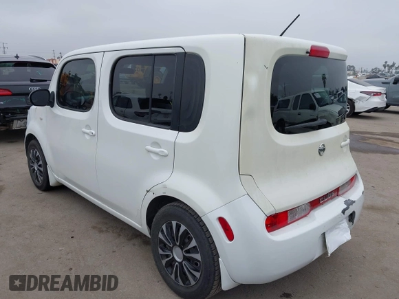 2012 Nissan Cube SL z VIN JN8AZ2KR5CT254201, wystawiony jako IAAI lot #42143061 z przebiegiem 186 435 mil mil oraz . Historia ofert i sprzedaży dostępna na DreamBid. Obrazek 3.
