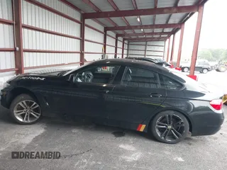 2015 BMW 4 Series 428i xDrive with VIN WBA4C9C57FD331872, listed as a IAAI auction lot 42276675 with 106,543 mi miles and . Bid and sale history available at DreamBid. Image 14.