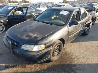 1999 Nissan Altima XE with VIN 1N4DL01D1XC226461, listed as a IAAI auction lot 41449355 with 193,000 mi miles. Bid and sale history available at carsss.com. Image 2.