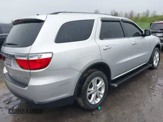 2012 Dodge Durango Crew with VIN 1C4RDJDG0CC322388, listed as a IAAI auction lot 42179814 with 124,009 mi miles and . Bid and sale history available at carsss.com. Image 4.