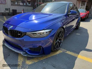 2018 BMW M3 with VIN WBS8M9C59J5L71951, listed as a IAAI auction lot 42129203 with 50,011 mi miles. Bid and sale history available at carsss.com. Image 2.