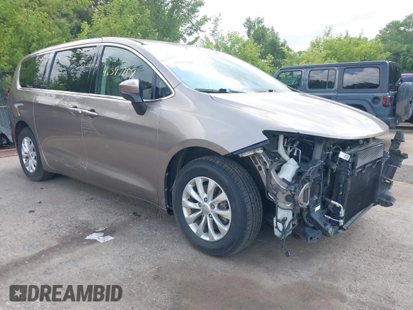 2017 Chrysler Pacifica Touring z VIN 2C4RC1DG2HR833473, wystawiony jako IAAI lot #42597208 z przebiegiem 78 239 mil mil oraz . Historia ofert i sprzedaży dostępna na DreamBid. Obrazek 1.