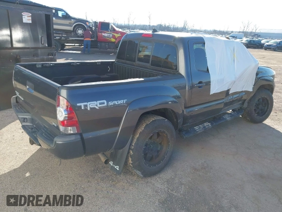 2014 Toyota Tacoma with VIN 3TMLU4EN0EM148389, listed as a IAAI auction lot 41490721 with 119,731 mi miles. Bid and sale history available at carsss.com. Image 4.