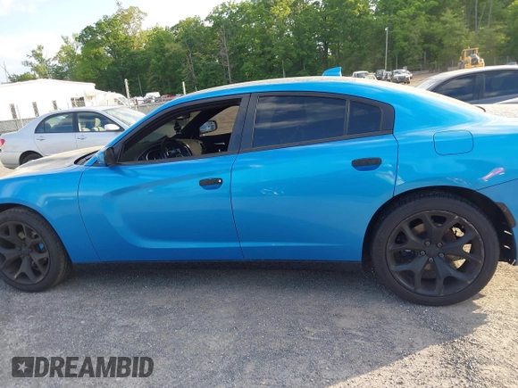 2015 Dodge Charger SXT with VIN 2C3CDXHG1FH848019, listed as a IAAI auction lot 42124399 with 175,247 mi miles and . Bid and sale history available at DreamBid. Image 13.