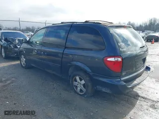 2007 Dodge Grand Caravan SXT with VIN 2D4GP44L37R356984, listed as a IAAI auction lot 41475361 with 153,843 mi miles. Bid and sale history available at carsss.com. Image 3.