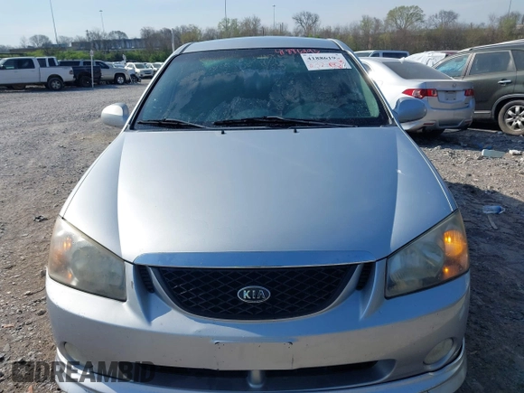 2006 Kia Spectra with VIN KNAFE161365208111, listed as a IAAI auction lot 41886193 with 292,535 mi miles. Bid and sale history available at carsss.com. Image 6.