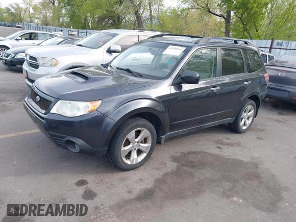 2009 Subaru Forester with VIN JF2SH65629H705318, listed as a IAAI auction lot 42120698 with 194,582 mi miles and . Bid and sale history available at DreamBid. Image 2.
