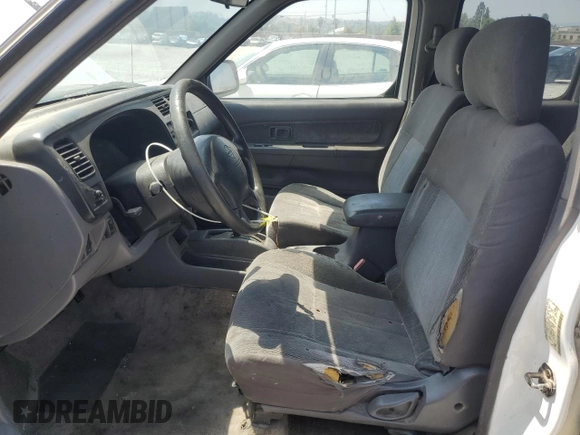 2000 Nissan Frontier XE with VIN 1N6ED27T8YC436513, listed as a Copart auction lot 60338695 with 307,757 mi miles and Clean title. Bid and sale history available at DreamBid. Image 7.