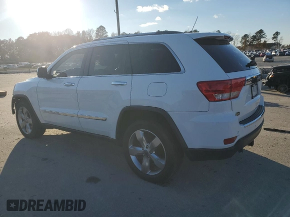 2013 Jeep Grand Cherokee Overland with VIN 1C4RJECG9DC644823, listed as a Copart auction lot 83232414 with 193,205 mi miles and Salvage Title. Bid and sale history available at carsss.com. Image 2.