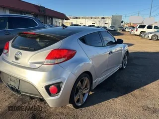 2013 Hyundai Veloster Turbo with VIN KMHTC6AE7DU115884, listed as a Copart auction lot 84959054 with 152,133 mi miles and Clean title. Bid and sale history available at DreamBid. Image 4.