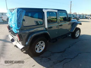 2021 Jeep Wrangler Unlimited Rubicon with VIN 1C4HJXFN1MW687231, listed as a Copart auction lot 85947774 with 35,076 mi miles and Salvage Title. Bid and sale history available at DreamBid. Image 3.