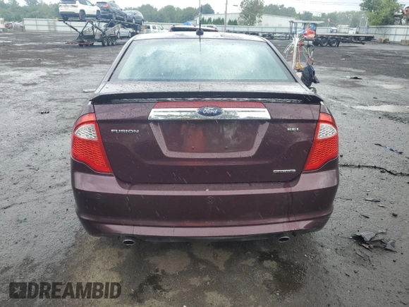 2012 Ford Fusion SEL with VIN 3FAHP0JG1CR358874, listed as a Copart auction lot 86041954 with 59,964 mi miles and Salvage Title. Bid and sale history available at DreamBid. Image 6.