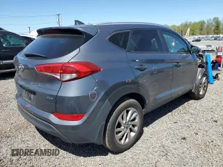 2018 Hyundai Tucson SEL with VIN KM8J3CA41JU784239, listed as a Copart auction lot 54331525 with 63,121 mi miles and Salvage title. Bid and sale history available at DreamBid. Image 3.