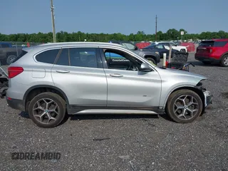2018 BMW X1 xDrive28i with VIN WBXHT3C32J5K23486, listed as a IAAI auction lot 42387208 with 76,115 mi miles and . Bid and sale history available at DreamBid. Image 14.