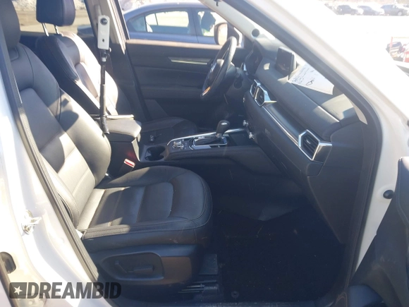 2019 Mazda CX-5 Grand Touring with VIN JM3KFBDM2K0672720, listed as a IAAI auction lot 41751196 with 51,632 mi miles and . Bid and sale history available at carsss.com. Image 5.