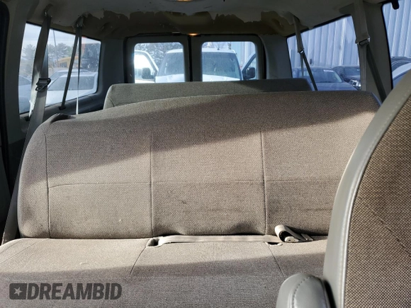 2004 Ford Econoline Passenger XL with VIN 1FMRE11W54HB15178, listed as a Copart auction lot 83088104 with 248,516 mi miles and Salvage Title. Bid and sale history available at DreamBid. Image 10.