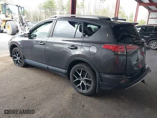 2016 Toyota RAV4 SE with VIN JTMJFREV7GJ072488, listed as a IAAI auction lot 42031254 with 106,901 mi miles. Bid and sale history available at carsss.com. Image 3.