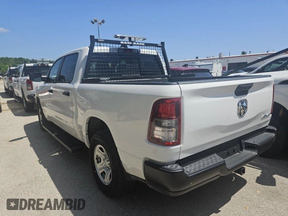 2023 Ram 1500 Tradesman with VIN 1C6RRFGG7PN620433, listed as a IAAI auction lot 42796101 with 48 mi miles and . Bid and sale history available at DreamBid. Image 2.