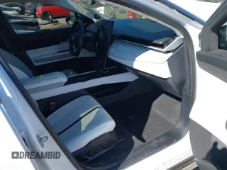 2023 Fisker Ocean Extreme z VIN VCF1EBU21PG007800, wystawiony jako IAAI lot #41640488 z przebiegiem 22 975 mil mil oraz . Historia ofert i sprzedaży dostępna na DreamBid. Obrazek 5.