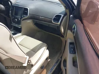 2015 Jeep Grand Cherokee Overland with VIN 1C4RJFCT9FC859740, listed as a IAAI auction lot 42187933 with 231,481 mi miles. Bid and sale history available at carsss.com. Image 5.