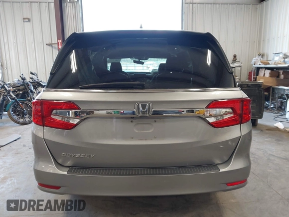 2018 Honda Odyssey EX-L z VIN 5FNRL6H70JB059653, wystawiony jako IAAI lot #42324330 z przebiegiem 115 623 mil mil oraz . Historia ofert i sprzedaży dostępna na DreamBid. Obrazek 17.