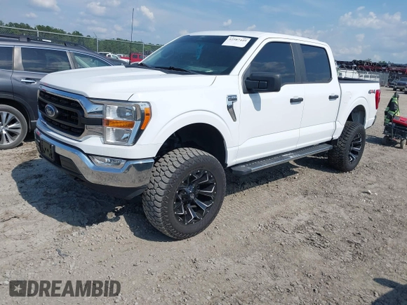 2022 Ford F-150 XL with VIN 1FTFW1E57NFB47648, listed as a IAAI auction lot 42587449 with 38,149 mi miles and . Bid and sale history available at DreamBid. Image 2.