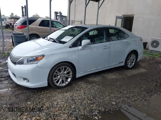 2010 Lexus HS 250h with VIN JTHBB1BA8A2014134, listed as a IAAI auction lot 40067857 with 121,313 mi miles and . Bid and sale history available at DreamBid. Image 2.