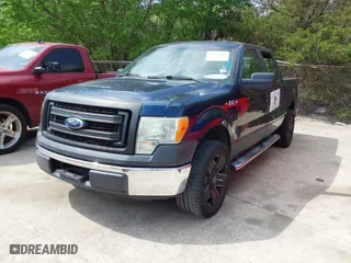 2013 Ford F-150 XL with VIN 1FTFW1CF2DKE57224, listed as a IAAI auction lot 41940686 with 148,482 mi miles. Bid and sale history available at carsss.com. Image 2.