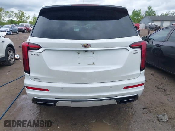 2021 Cadillac XT6 Premium Luxury z VIN 1GYKPDRS0MZ141453, wystawiony jako IAAI lot #42215954 z przebiegiem 144 245 mil mil oraz . Historia ofert i sprzedaży dostępna na DreamBid. Obrazek 17.