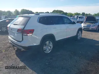 2018 Volkswagen Atlas SEL Premium with VIN 1V2NR2CA5JC571171, listed as a IAAI auction lot 42174807 with 131,690 mi miles and . Bid and sale history available at DreamBid. Image 4.