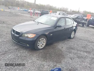 2006 BMW 3 Series 325i with VIN WBAVB13536KX37524, listed as a IAAI auction lot 42040781 with 123,020 mi miles. Bid and sale history available at carsss.com. Image 2.