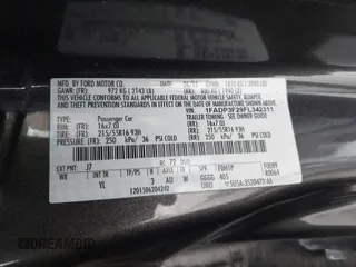 2015 Ford Focus SE with VIN 1FADP3F29FL342311, listed as a IAAI auction lot 42109683 with 70,579 mi miles. Bid and sale history available at carsss.com. Image 9.