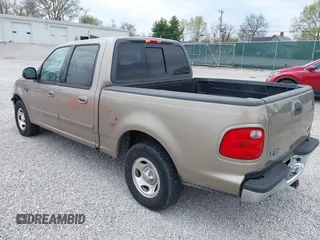 2001 Ford F-150 XLT with VIN 1FTRW07W01KB64001, listed as a IAAI auction lot 41903682 with 175,396 mi miles and . Bid and sale history available at DreamBid. Image 3.