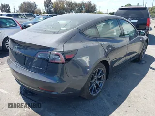 2023 Tesla Model 3 Long Range with VIN 5YJ3E1EB6PF682747, listed as a IAAI auction lot 41980506 with 32,541 mi miles and . Bid and sale history available at DreamBid. Image 4.
