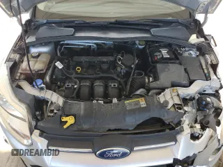 2012 Ford Focus SE with VIN 1FAHP3F29CL161559, listed as a Copart auction lot 61695575 with 127,412 mi miles and Salvage title. Bid and sale history available at DreamBid. Image 11.