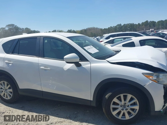 2013 Mazda CX-5 Touring with VIN JM3KE2CE0D0119032, listed as a IAAI auction lot 41891556 with 174,745 mi miles and . Bid and sale history available at carsss.com. Image 13.