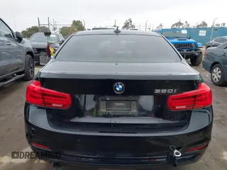 2016 BMW 3 Series 320i with VIN WBA8A9C51GK617012, listed as a IAAI auction lot 41896624 with 56,289 mi miles. Bid and sale history available at carsss.com. Image 16.