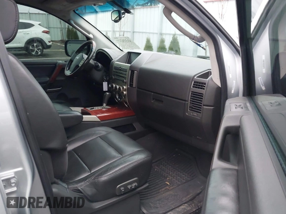 2005 Infiniti QX56 with VIN 5N3AA08C45N809319, listed as a IAAI auction lot 41324227 with 138,457 mi miles. Bid and sale history available at carsss.com. Image 5.