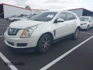 2014 Cadillac SRX Luxury Collection with VIN 3GYFNBE36ES519705, listed as a IAAI auction lot 42069288 with 211,632 mi miles and . Bid and sale history available at carsss.com. Image 2.
