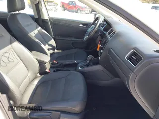 2012 Volkswagen Jetta Sedan SE w/Convenience with VIN 3VWDX7AJ1CM062454, listed as a IAAI auction lot 41580811 with 119,760 mi miles. Bid and sale history available at carsss.com. Image 5.