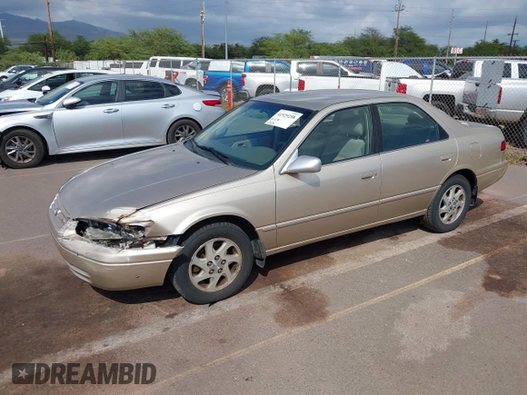 1999 Toyota Camry LE z VIN JT2BF22K9X0222119, wystawiony jako IAAI lot #41529258 z przebiegiem 119 919 mil mil oraz . Historia ofert i sprzedaży dostępna na DreamBid. Obrazek 2.