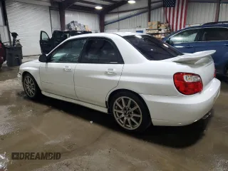 2004 Subaru Impreza Sedan (Natl) WRX STi w/Gold Wheels with VIN JF1GD70674L517323, listed as a Copart auction lot 86093954 with 58,180 mi miles and Salvage Title. Bid and sale history available at carsss.com. Image 2.